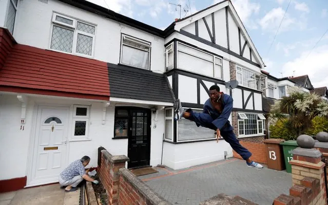 Team GB taekwondo athlete Lutalo Muhammad trains at his home in Walthamstow, following the outbreak of the coronavirus disease (COVID-19), London, Britain, May 24, 2020. (Photo by Paul Childs/Reuters)