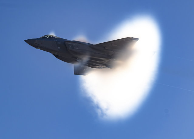 Jaw-dropping image captures American warplane creating mesmerising vapour cone. U.S. Air Force Maj. Melanie “Mach” Kluesner, pilot for the F-35A Lightning II Demonstration Team, executes precision aerial manoeuvres during a practice airshow at Hill Air Force Base, Utah in the first decade of December 2024. (Photo by Senior Airman Nicholas Rupiper/U.S. Air Force/Capture Media Agency)