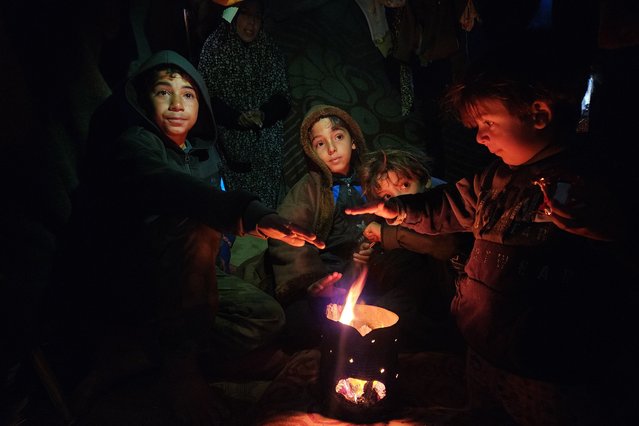 Palestinians are trying to survive in makeshift tents among ruins following ceasefire agreement between Israel and Hamas, struggling with bad weather conditions in Khan Yunis, Gaza on February 06, 2025.  (Photo by Hani Alshaer/Anadolu Agency)