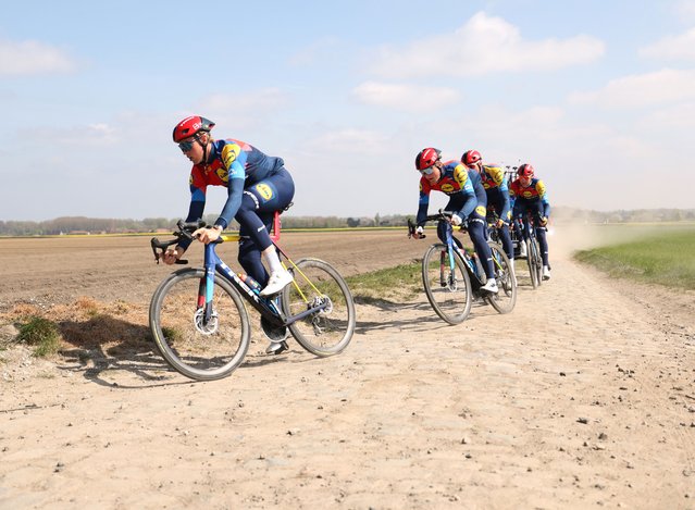 Team Lidl riders cycle on the paved sector during a reconnaissance ride for the 122nd edition of the Paris-Roubaix upcoming cycling event in Haveluy on April 10, 2025. The men's race of Paris-Roubaix which takes place on April 13, will see current rivals Slovenia's Tadej Pogacar and Netherlands' Mathieu Van der Poel duel over the cobbled roads near the Franco-Belgian border in the seasons latest “Monument” race. (Photo by Francois Lo Presti/AFP Photo)