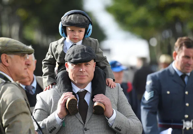 Visitors and car enthusiasts attend the annual Goodwood Revival historic motor racing festival, celebrating a mid-twentieth century heyday of the racing circuit, near Chichester in south England, Britain, September 9, 2016. (Photo by Toby Melville/Reuters)