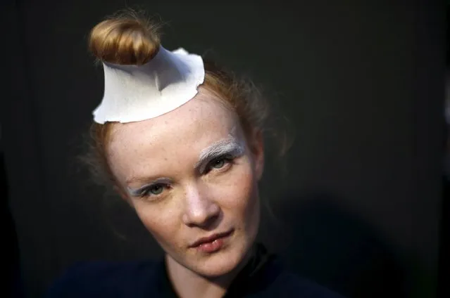 A model poses while waiting backstage before the Christophe Sauvat collection show during Lisbon Fashion Week, Portugal October 10, 2015. (Photo by Rafael Marchante/Reuters)