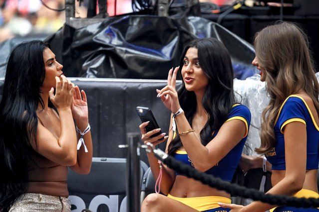 “Ring Girls” attend the undercard bouts before Oleksandr Usyk of Ukraine faces Daniel Dubois of Great Britain in their undisputed heavyweight title bout at the Wembley Stadium in London, Great Britain, 19 July 2025. It is the second meeting between the WBA (Super), WBO and WBC champion Usyk and IBF title-holder Dubois following their fight in 2023 which Usyk won. (Photo by Daniel Hambury/EPA)