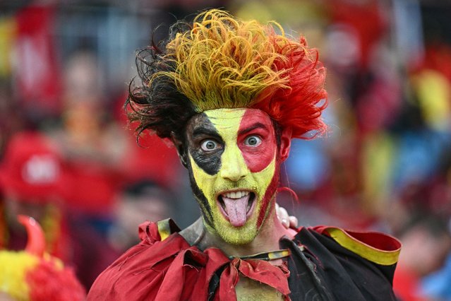A Belgium supporter poses before the start of the UEFA Euro 2024 Group E football match between Ukraine and Belgium at the Stuttgart Arena in Stuttgart on June 26, 2024. (Photo by Fabrice Coffrini/AFP Photo)