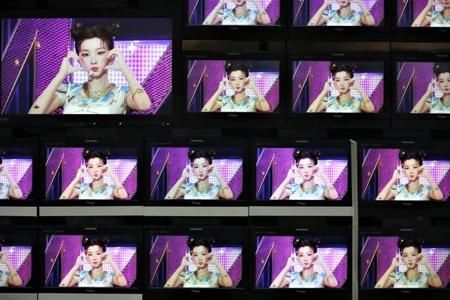 Footages of virtual girl group MAVE is played at the control room of MBC in Seoul, South Korea on February 28, 2023. (Photo by Kim Soo-hyeon/Reuters)