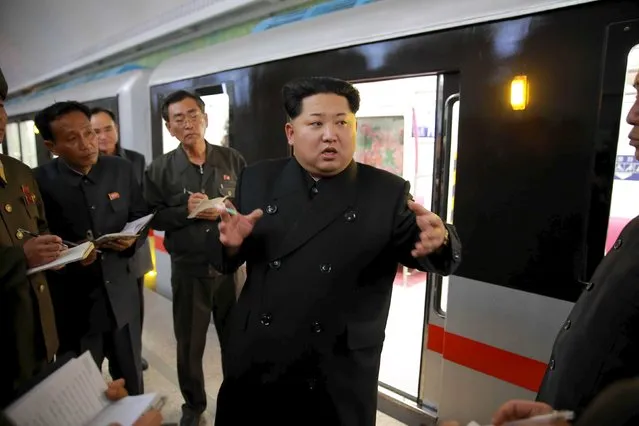 North Korean leader Kim Jong Un looks around a newly manufactured subway train at a station in Pyongyang, in this undated photo released by North Korea's Korean Central News Agency (KCNA) on November 20, 2015. (Photo by Reuters/KCNA)