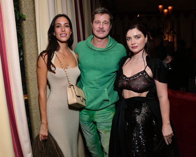 Ines de Ramon, Brad Pitt, and Eve Hewson attend Netflix's “Jay Kelly” Los Angeles premiere at Chateau Marmont on November 11, 2025 in Los Angeles, California. (Photo by Emma McIntyre/Getty Images for Netflix)