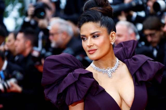 US-Mexican actress Salma Hayek Pinault gestures as she arrives for the screening of the film “Killers of the Flower Moon” during the 76th edition of the Cannes Film Festival in Cannes, southern France, on May 20, 2023. (Photo by Eric Gaillard/Reuters)