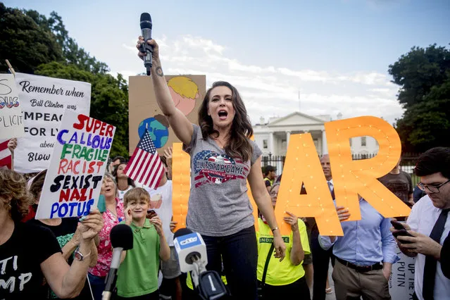 Actress Alyssa Milano speaks at a protest outside the White House, Tuesday, July 17, 2018, in Washington. This is the second day in a row the group has held a protest following President Donald Trump's meetings with Russian President Vladimir Putin. (Photo by Andrew Harnik/AP Photo)