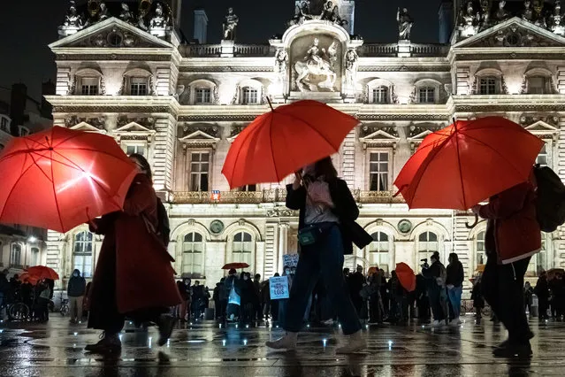 More than one hundred people holding a red umbrella gathered in Lyon, place des Terreaux, as part of the International Day for the Elimination of Violence against Sеx Workers in Lyon, France on December 17, 2020. (Photo by  Konrad K./SIPA Press/Rex Features/Shutterstock)