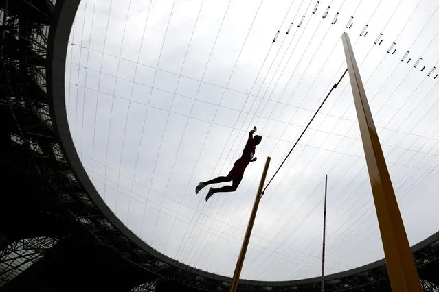 China's Sun Qihao competes during the men's decathlon pole vault 159at the 19th Asian Games in Hangzhou, China, Tuesday, October 3, 2023. (Photo by Lee Jin-man/AP Photo)