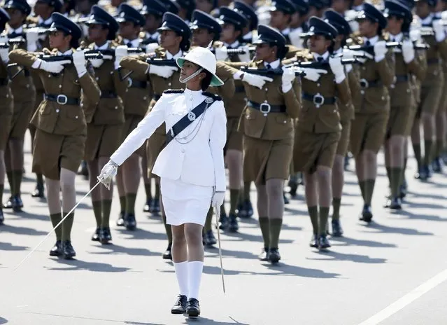 Sri Lankan female police officers march during Sri Lanka's 68th Independence day celebrations in Colombo, February 4, 2016. (Photo by Dinuka Liyanawatte/Reuters)