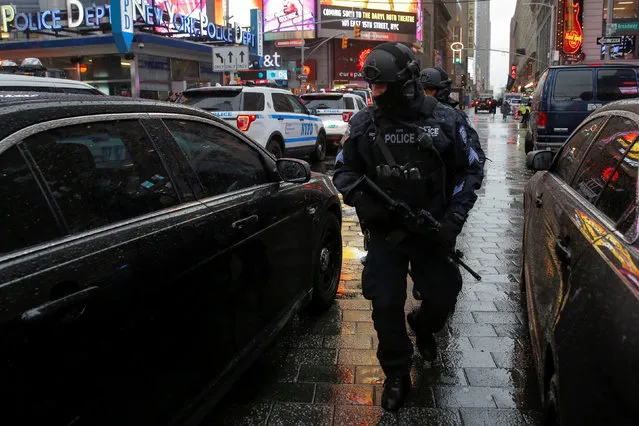 Members of the New York Police Department's Counterterrorism Bureau patrol Times Square in the lead up to New Year's celebrations in Manhattan, New York City, U.S. December 29, 2016. (Photo by Andrew Kelly/Reuters)