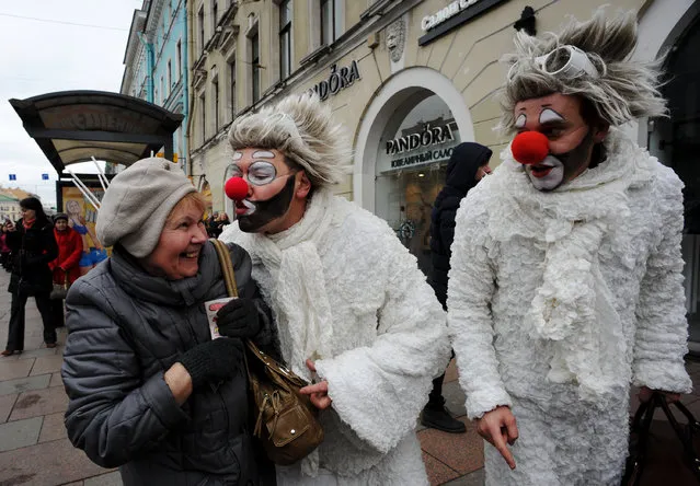 Artists perform in central Saint Petersburg on April 1, 2015 to mark April Fools' Day. (Photo by Olga Maltseva/AFP Photo)