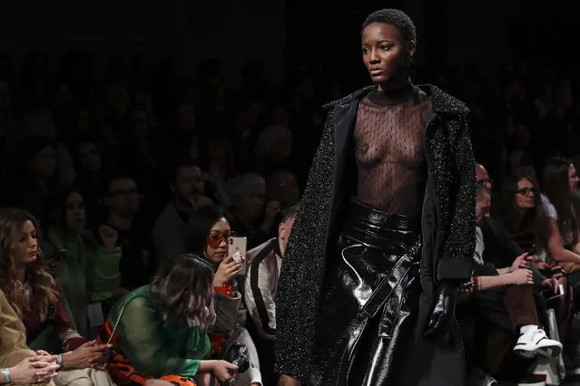 A model displays a creation by Portuguese designer Carlos Gil on the second day of the Lisbon Fashion Week, at the Carlos Lopes Pavillion in Lisbon, Portugal, 09 March 2019. (Photo by Miguel A. Lopes/EPA/EFE)