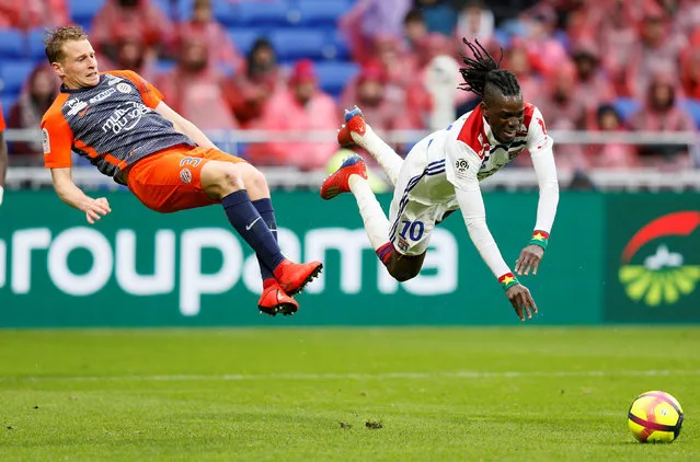 Montpellier's Nicolas Cozza in action with Lyon's Bertrand Traore during the French L1 football match between Lyon (OL) and Montpellier (MHSC) on March 17, 2018, at the Groupama Stadium in Decines-Charpieu, near Lyon, central-eastern France. (Photo by Emmanuel Foudrot/Reuters)