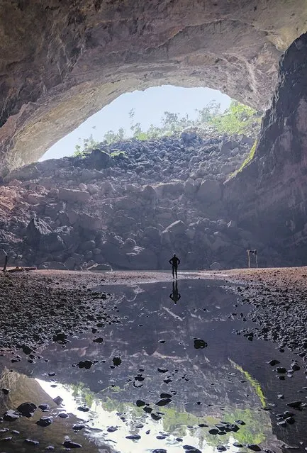 Looking out of the cave by the beach. (Photo by Lars Krux/Caters News)