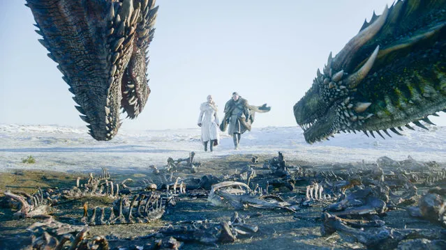 This image released by HBO shows  Emilia Clarke, left, and Kit Harington in a scene from “Game of Thrones”, premiering on Sunday, April 14. The first episode of the final season of “Game of Thrones” is a record-breaker for the series and HBO. The pay channel said the 17.4 million viewers who watched Sunday’s episode either on TV or online represent a season-opening high for the fantasy saga. (Photo by HBO via AP Photo)