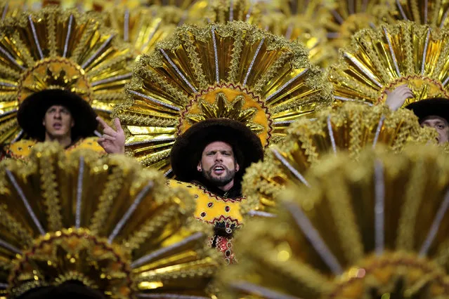 Revellers parade for the Tom Maior samba school during the carnival in Sao Paulo, Brazil, February 24, 2017. (Photo by Paulo Whitaker/Reuters)