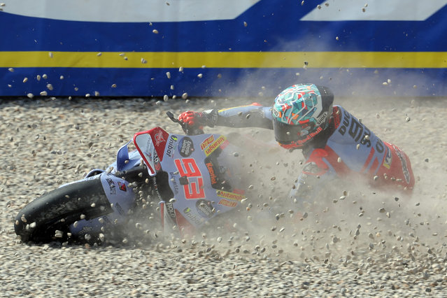Ducati Spanish rider Marc Marquez crashes during the second MotoGP free practice session of the Moto Grand Prix of Catalonia at the Circuit de Catalunya on May 25, 2024 in Montmelo on the outskirts of Barcelona. (Photo by Lluis Gene/AFP Photo)