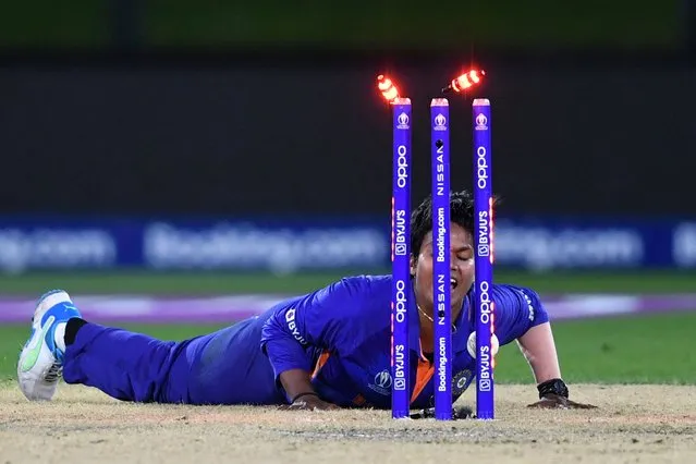 India's Deepti Sharma runs out South Africa's Trisha Chetty during the Women's Cricket World Cup match between South Africa and India at Hagley Oval in Christchurch on March 27, 2022. (Photo by Sanka Vidanagama/AFP Photo)