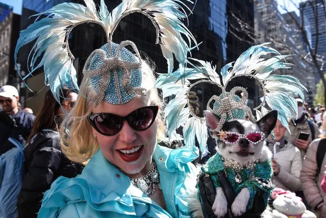 People participate in the Easter Bonnet Parade along 5th Ave. in front of St. Patrick's Cathedral on April 17, 2022 in the borough of Manhattan in New York City. (Photo by Stephanie Keith/Getty Images)