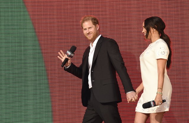 Prince Harry, the Duke of Sussex, left, and Meghan, the Duchess of Sussex appear at Global Citizen Live in Central Park on Saturday, September 25, 2021, in New York. (Photo by Evan Agostini/Invision/AP Photo)