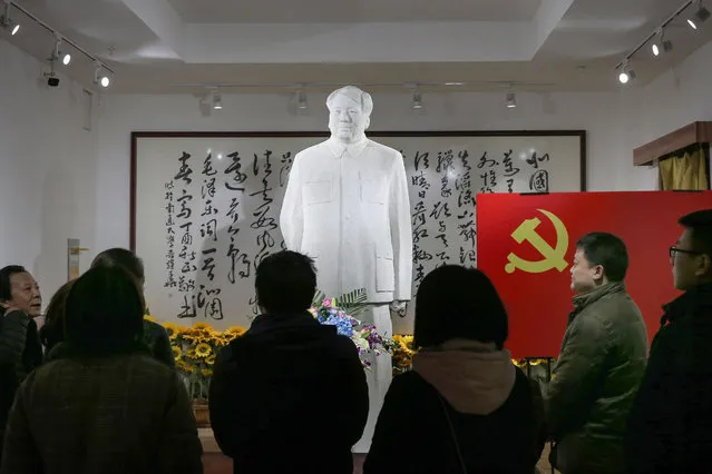 People visit a museum of artworks of the late former Chinese Communist Party leader Mao Zedong to mark his 126th birthday, in Nantong in China's eastern Jiangsu province on December 26, 2019. (Photo by AFP Photo/China Stringer Network)