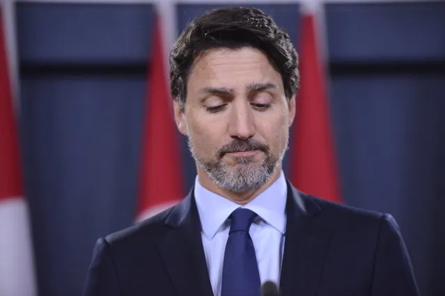 Prime Minister Justin Trudeau holds a news conference in Ottawa on Wednesday, January 8, 2020. (Photo by Sean Kilpatrick/The Canadian Press via AP Photo)