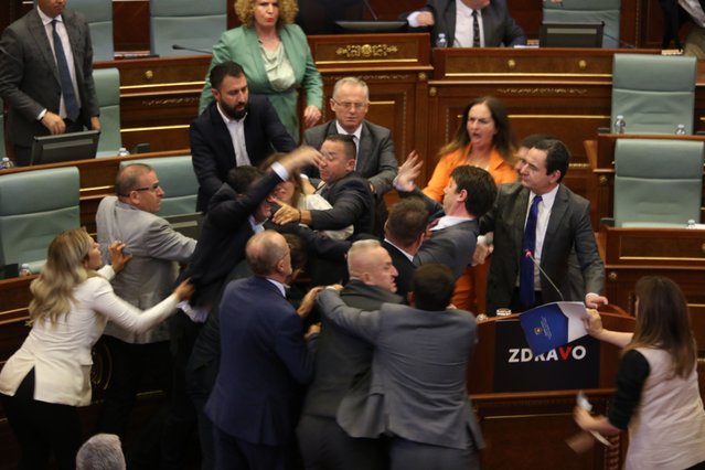 Fight breaks out between the opposition and ruling parliament members while Kosovan Prime Minister Albin Kurti (R) was giving a speech at the Assembly of the Republic of Kosovo in Pristina on July 13, 2023. (Photo by Erkin Keci/Anadolu Agency via Getty Images)