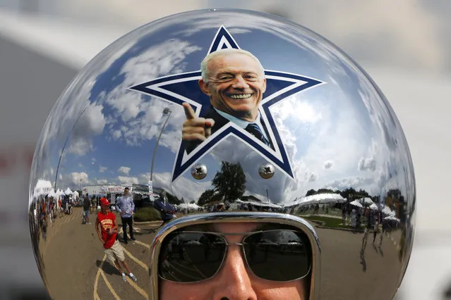 Dallas Cowboys fan Gregg Wilson, of Dallas, arrives for the Pro Football Hall of Fame inductions, including that of Cowboys owner Jerry Jones, whose photo is on the helmet, at the Pro Football Hall of Fame on Saturday, August 5, 2017, in Canton, Ohio. (Photo by Gene J. Puskar/AP Photo)