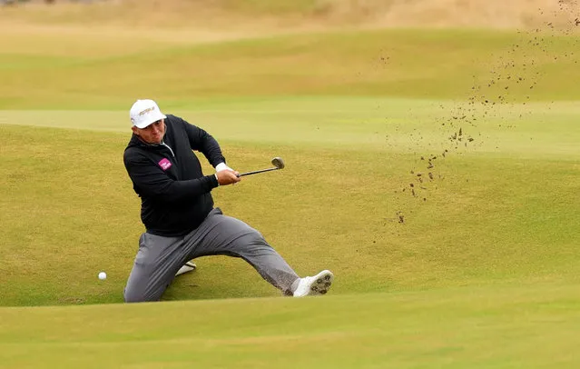 England's Marcus Armitage plays out of a bunker on the 14th during the second round at the 150th Open Championship, in St Andrews, Scotland, Britain on July 15, 2022. (Photo by Phil Noble/Reuters)