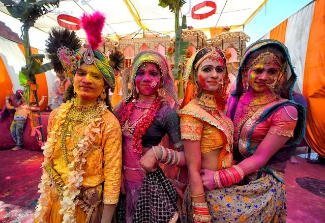 Women wearing colourful traditional outfit take part during the Holi Festival celebration in Mathura, India on March 7, 2020. Holi Festival of India is one of the biggest Holi celebration in India as many tourists and devotees gather to observe this colourful programme. (Photo by Avishek Das/SOPA Images/Rex Features/Shutterstock)