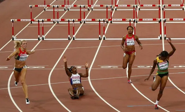 Danielle Williams (R) of Jamaica crosses the finish line in front of Cindy Roleder of Germany (L), Tiffany Porter of Britain (2ndL) and Sharika Nelvis of the U.S. (2ndR) to win the women's 100 metres hurdles final during the 15th IAAF World Championships at the National Stadium in Beijing, China, August 28, 2015. (Photo by David Gray/Reuters)