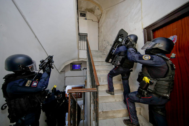 Special police units, financial police and carabinieri, take part in the joint operation with “High Impact” mode, in the Spanish quarters of Naples, Italy on September 7, 2023. In total, 800 officers were involved. (Photo by Ciro Fusco/EPA/EFE)