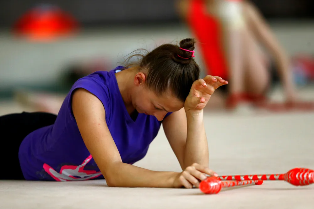 Gymnasts Stretch for Success