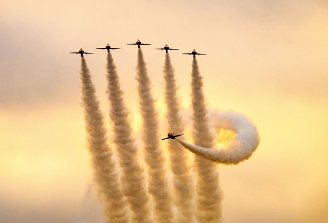 The Red Arrows made the most of the dry weather to practice manoeuvres in the skies over RAF Waddington in Lincolnshirein in the first decade of December 2024. (Photo by Claire Hartley/Bav Media)