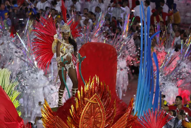 Dancers perform during the closing ceremony for the Summer Olympics in Rio de Janeiro, Brazil, Sunday, August 21, 2016. (Photo by Vincent Thian/AP Photo)