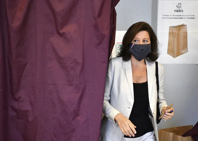 Agnes Buzyn, candidate for the presidential party La Republique en Marche (LREM) in the second round of municipal elections, leaves the voting booth before voting Sunday, June 28, 2020 in Paris. France is holding the second round of municipal elections in 5,000 towns and cities Sunday that got postponed due to the country's coronavirus outbreak. (Photo by Christophe Archambault, Pool via AP Photo)