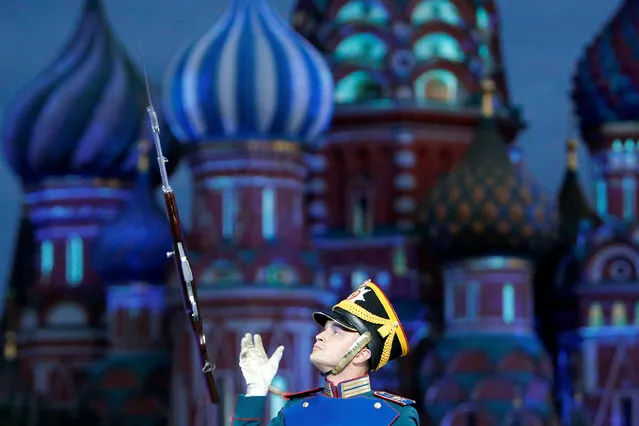 A member of the Guard of Honour of the Presidential regiment performs during the International Military Orchestra Music Festival “Spasskaya Tower” media preview in Red Square in Moscow, Russia, August 26, 2016. (Photo by Sergei Karpukhin/Reuters)