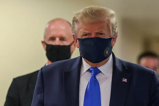 U.S. President Donald Trump wears a mask while visiting Walter Reed National Military Medical Center in Bethesda, Maryland, U.S., July 11, 2020. (Photo by Tasos Katopodis/Reuters)