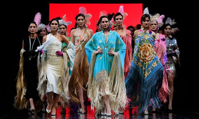 Models present Manila shawls by Juan Foronda during the International Flamenco Fashion Week – SIMOF in Sevilla on January 18, 2024. (Photo by Cristina Quicler/AFP Photo)