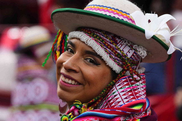 A Carnival dancer performs during the “Jisk'a Anata”, or “small party” in the Aymara Indigenous language in La Paz, Bolivia, Monday, February 12, 2024. (Photo by Juan Karita/AP Photo)