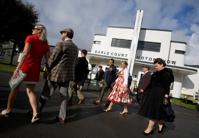 Visitors and car enthusiasts attend the annual Goodwood Revival historic motor racing festival, celebrating a mid-twentieth century heyday of the racing circuit, near Chichester in south England, Britain, September 9, 2016. (Photo by Toby Melville/Reuters)