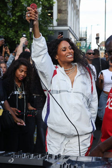 American singer-songwriter and dancer Ciara wore an understated white tracksuit and sand three songs in what has become a free popular outdoor mini concert featuring established and emerging artists outside of King’s Cross Station in London early June 2025. She greeted fans, signed albums and took selfies before sitting on top of hour tour bus to bid one final goodbye. (Photo by Lensi Photography/Splash News and Pictures)
