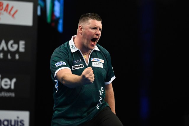 Daryl Gurney of Northern Ireland celebrates against Germany during their semi-final match on day four of BetVictor World Cup of Darts 2025 at Eissporthalle Frankfurt on June 15, 2025 in Frankfurt am Main, Germany. (Photo by Florian Wiegand/Getty Images)