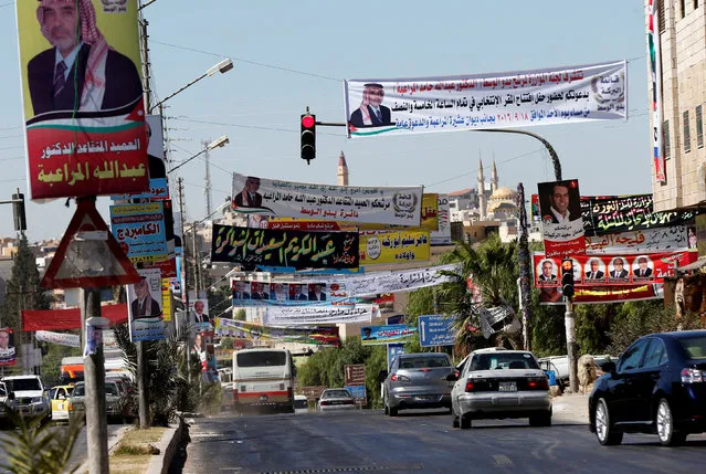 Electoral posters for parliamentary candidates are seen ahead of the general elections on Tuesday, in Madaba city, near Amman, Jordan, September 19, 2016. (Photo by Muhammad Hamed/Reuters)