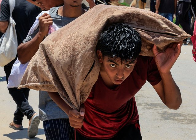 A Palestinian collects aid supplies from the U.S.-backed Gaza Humanitarian Foundation, in Rafah, in the southern Gaza Strip on June 9, 2025. (Photo by Hatem Khaled/Reuters)