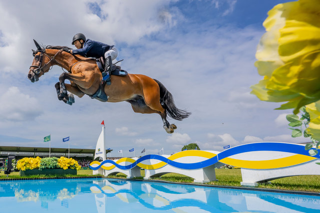 José María Larocca of Argentina riding Finn Lente soars over a water jump in the Rolex Grand Prix in Falsterbo, Sweden on July 13, 2025. (Photo by Petter Arvidson/Bildbyran/Rex Features/Shutterstock)