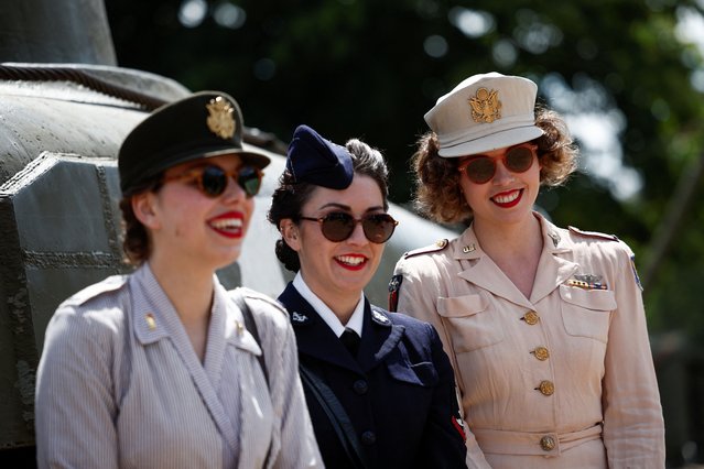 World War II reenactors gather ahead of the 80th anniversary of the 1944 D-Day landings in Sainte-Mere-Eglise, Normandy region, France, on June 2, 2024. (Photo by Benoit Tessier/Reuters)